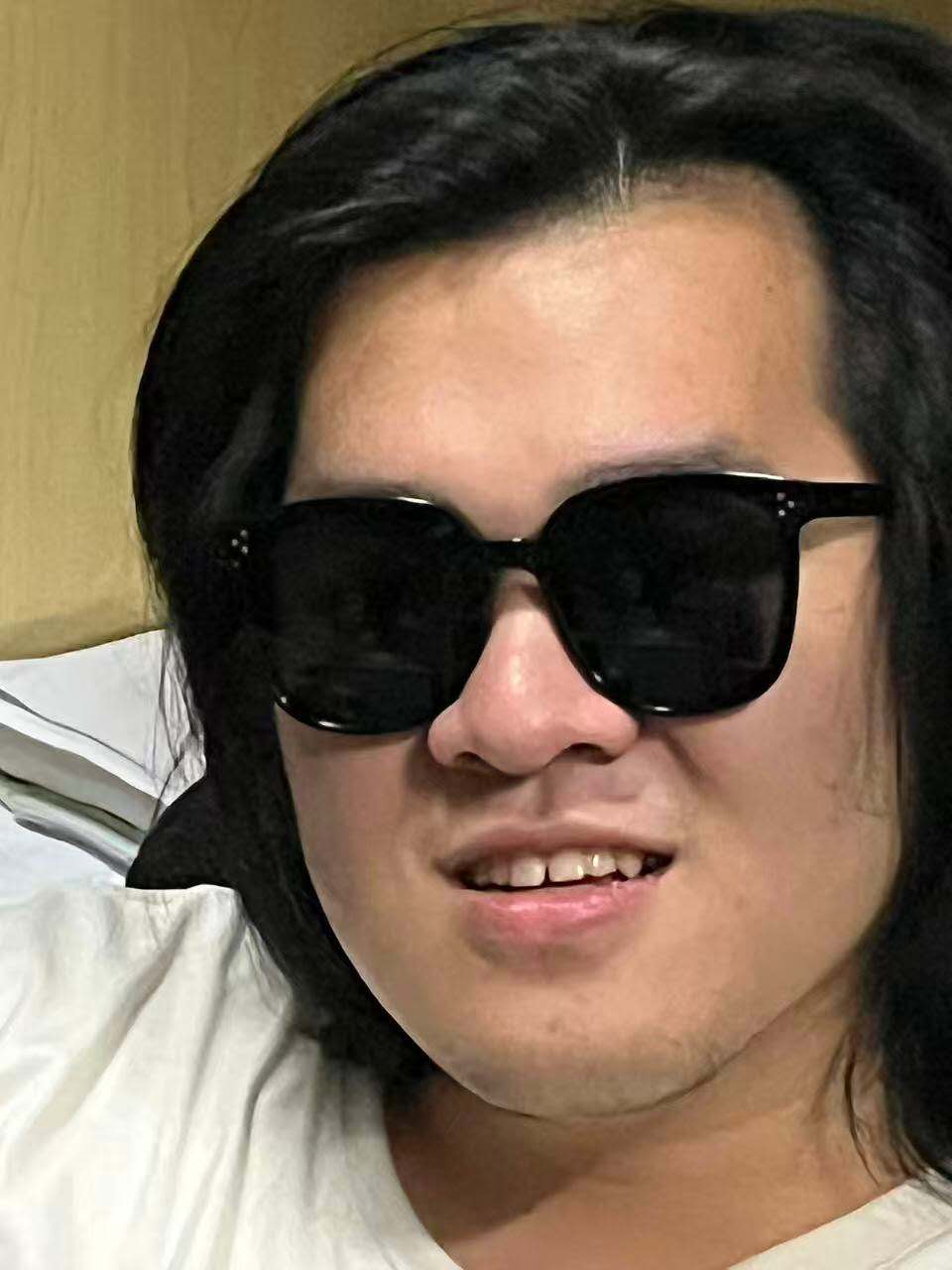 Guangyi Zou